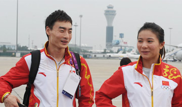 中国奥运代表团抵京