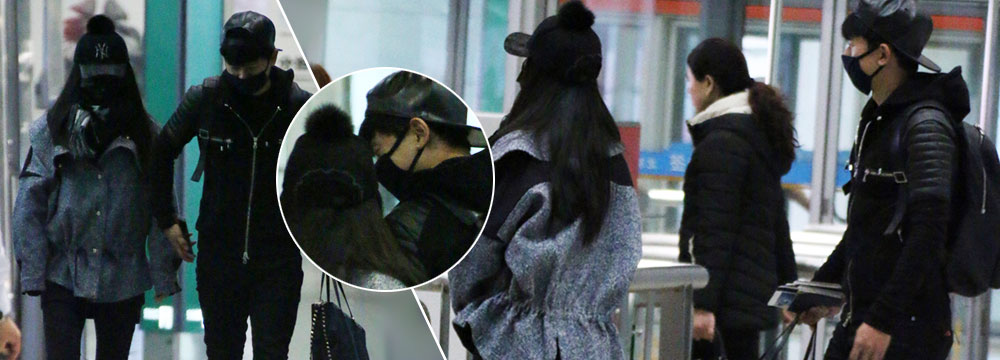 谢娜低调赴美口罩遮面 张杰为妻子拎包