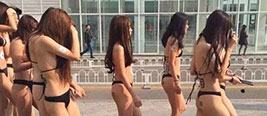 数名女子北京街头裸身推销APP 商家被罚20万