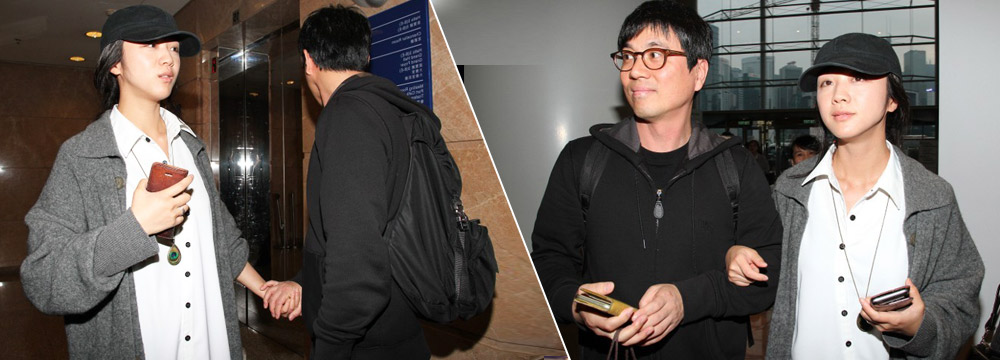  汤唯挺大肚看艺术展 与老公十指扣环好甜蜜！ 
