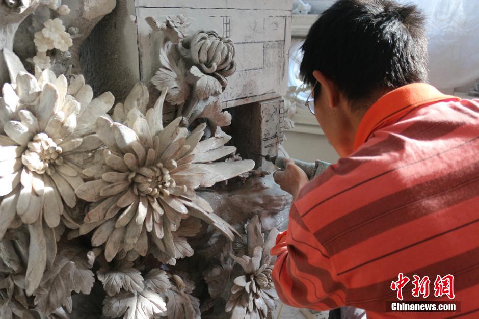 探访“世界第一”浏阳菊花石雕制作工坊_频道_凤凰网