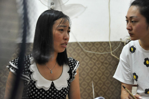 7月14日,唐慧在入住的旅店内接受记者采访。新华社记者 龙弘涛 摄