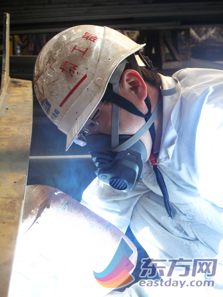 [履职一年间]十八大代表洪刚:从焊接生产效率提