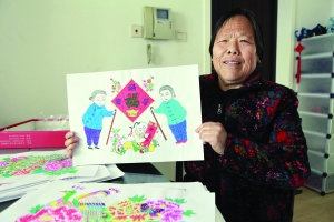 这幅"山东娘家妈"是刘奶奶最喜欢的一幅画 现代快报记者 邱稚真 摄