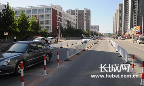 物理隔离 巧用护栏 治理学校周边交通拥堵新思