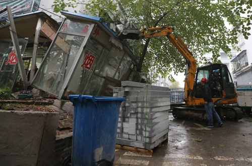 西城区城管棚亭阁现场。
