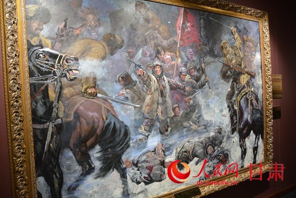 反映红军西路军妇女团与马匪军战斗场景的油画（刘海天 摄）