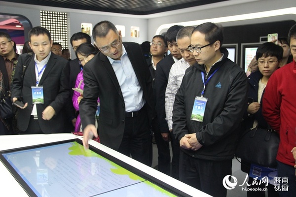 农业部市场与经济信息司司长唐珂等调研海口石山互联网农业小镇
