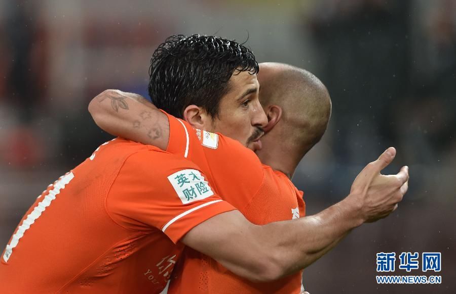 足球--中超:山东鲁能胜河南建业