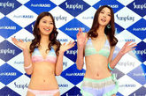 河北模特胡楠赴日本代言泳衣，甜美亮相大展修长身姿。