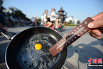扬州持续高温 地面温度可“烤”鸡蛋