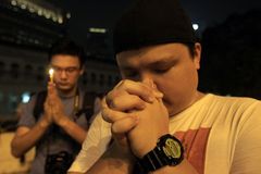 马来西亚华人为失联航班祈福