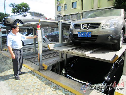 申城小区停车难如何破解? 立体停车库推广遭遇