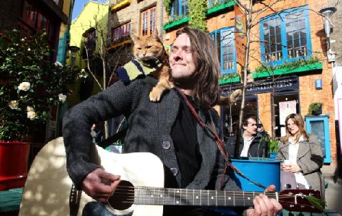 卖唱五元一首搞笑图片_街头卖唱收入(3)