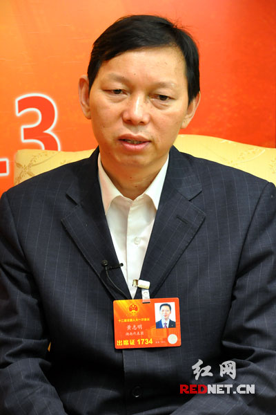 [全国两会访谈]黄志明代表:改革土地制度 助推实
