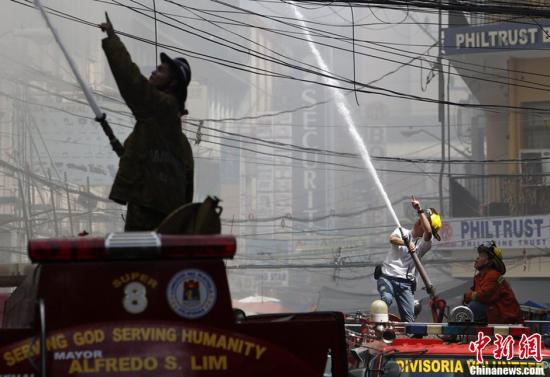 菲律宾马尼拉华人区商场大火损失惨重 中使馆