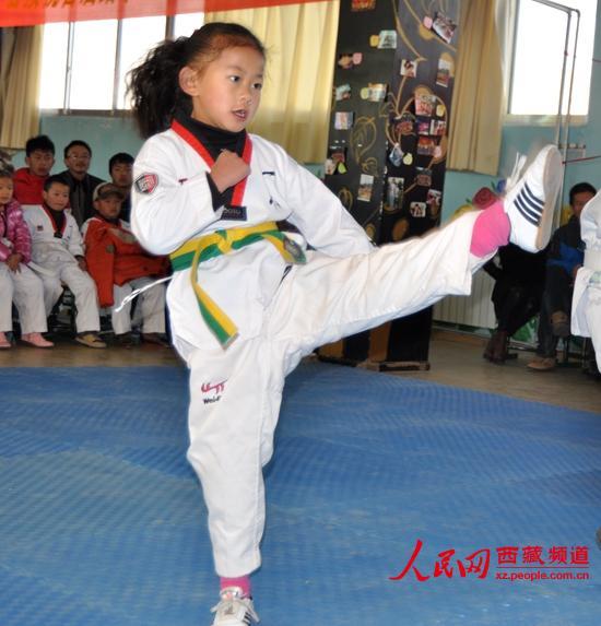 拉萨3所学校免费教授<em>跆拳道</em> 晋级考试举行|学生