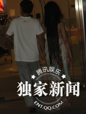 邓建国与干露露牵手被抓包