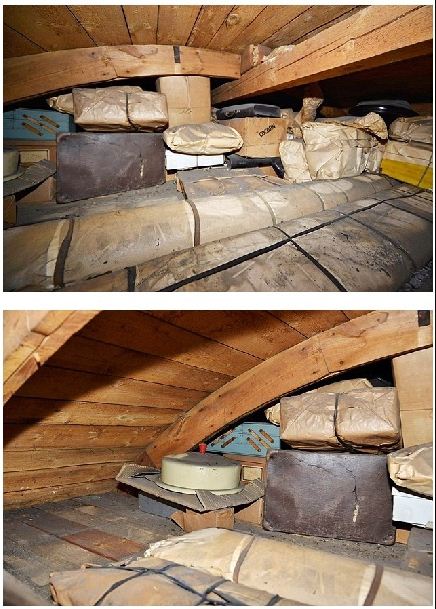 在当地政府的陪同下,好不容易在屋顶里找到当年父亲整齐的用油纸包好