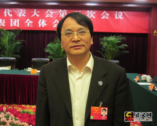 全国人大代表,江苏省启东市人大常委会副主任,启东中学校长王生.