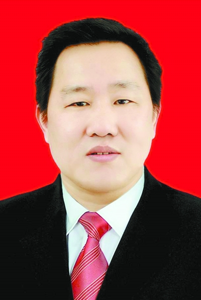 石玉林   通讯员摄 本报记者 周勇军 通讯员 苏建新 石玉林:我们与